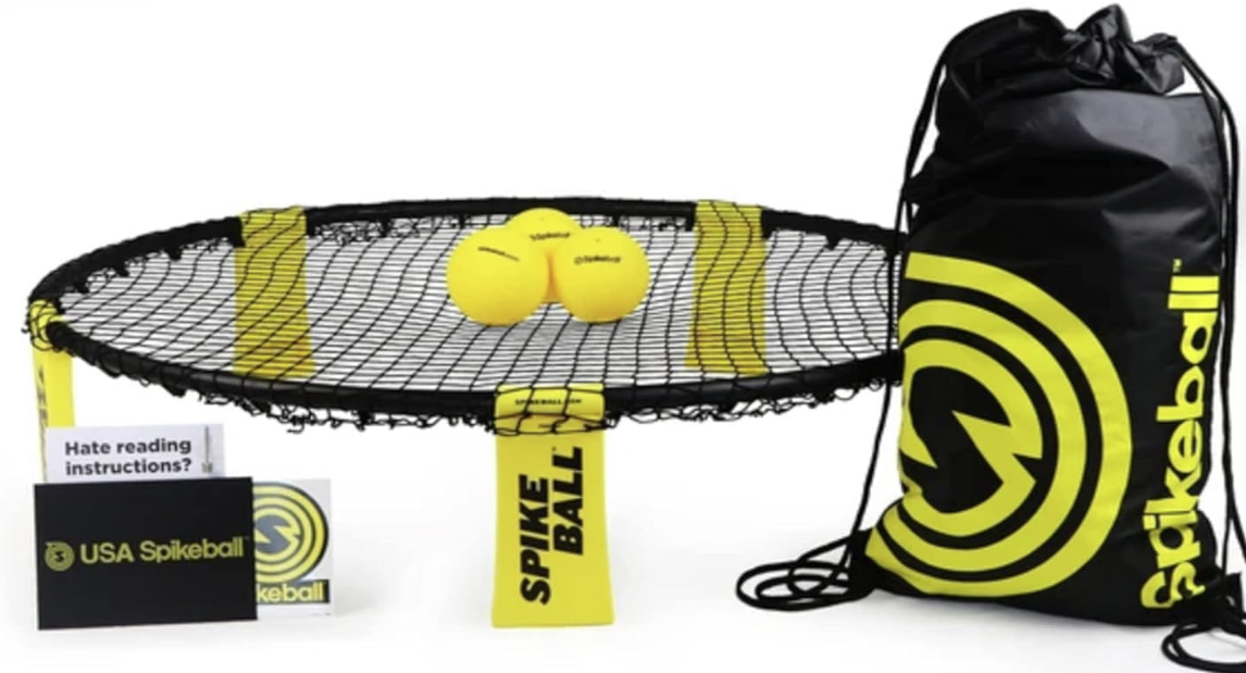 Spikeball net with yellow balls and drawstring bag