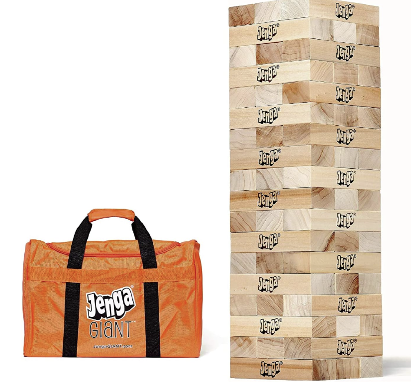 Giant Jenga wooden block tower with orange carrying bag